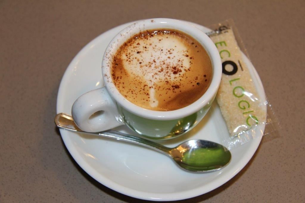 Imagen de taza de café con espuma